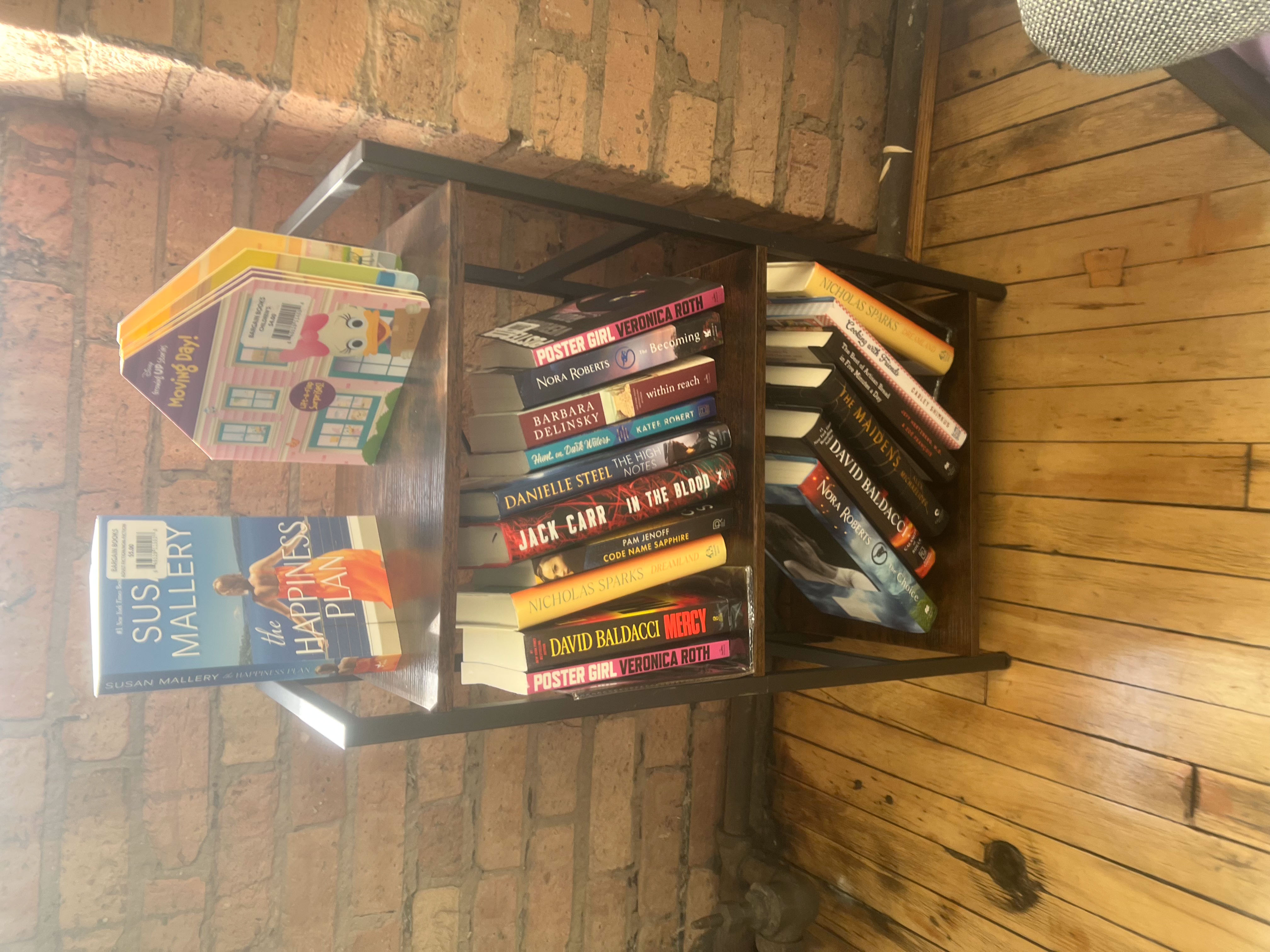 Bookshelf filled with books for clients