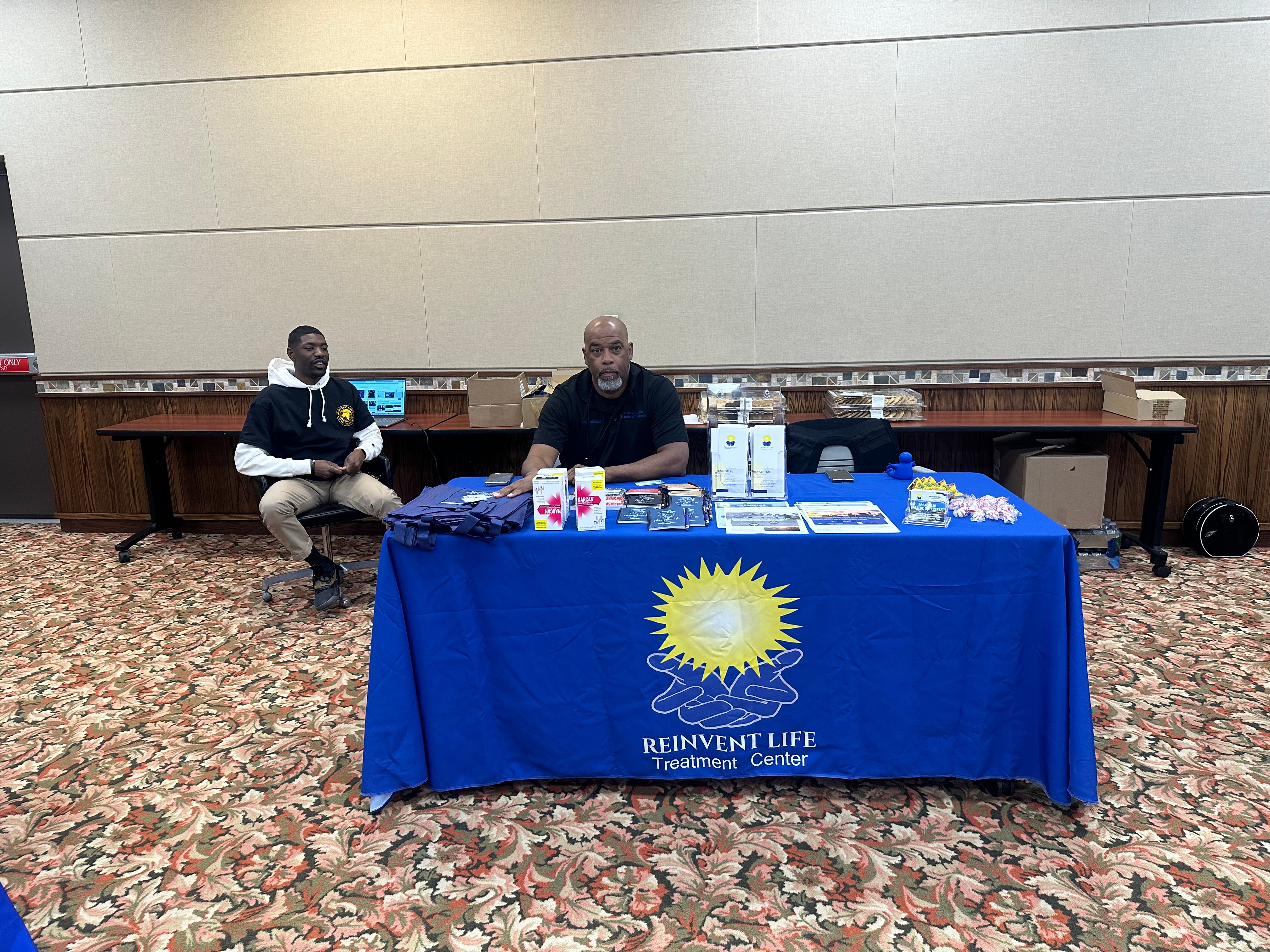 Staff engaging community at resource fair