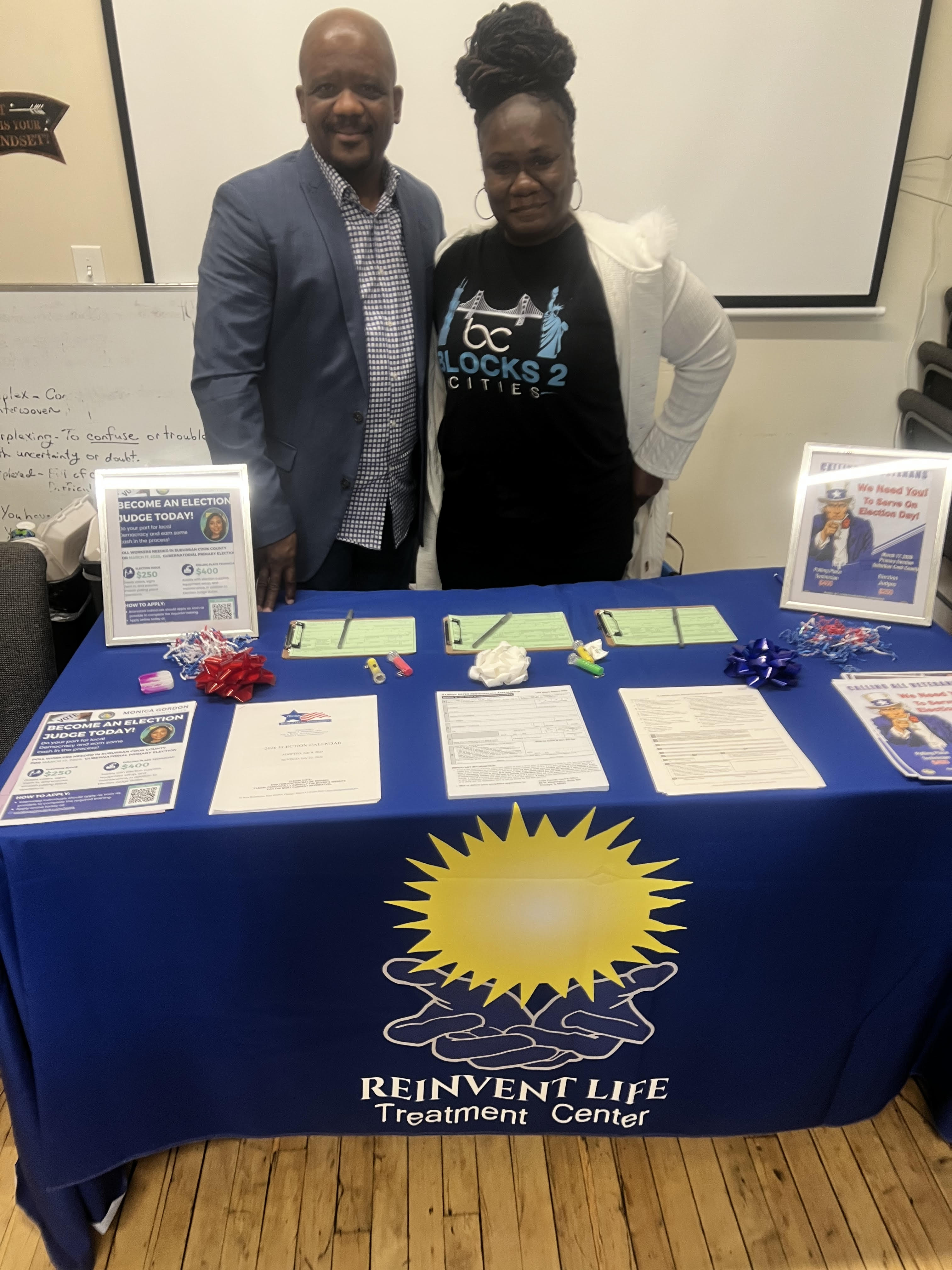 Staff members at the voter registration table